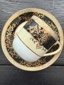 Imperfect vintage Bruja demitasse and saucer