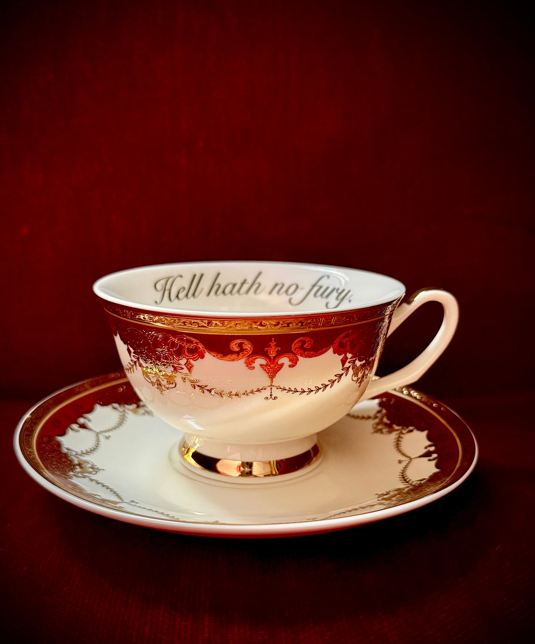 America the Beautiful Fury Cup - a striking crimson teacup with elegant gold detailing, perfect for expressing inner strength and beauty.