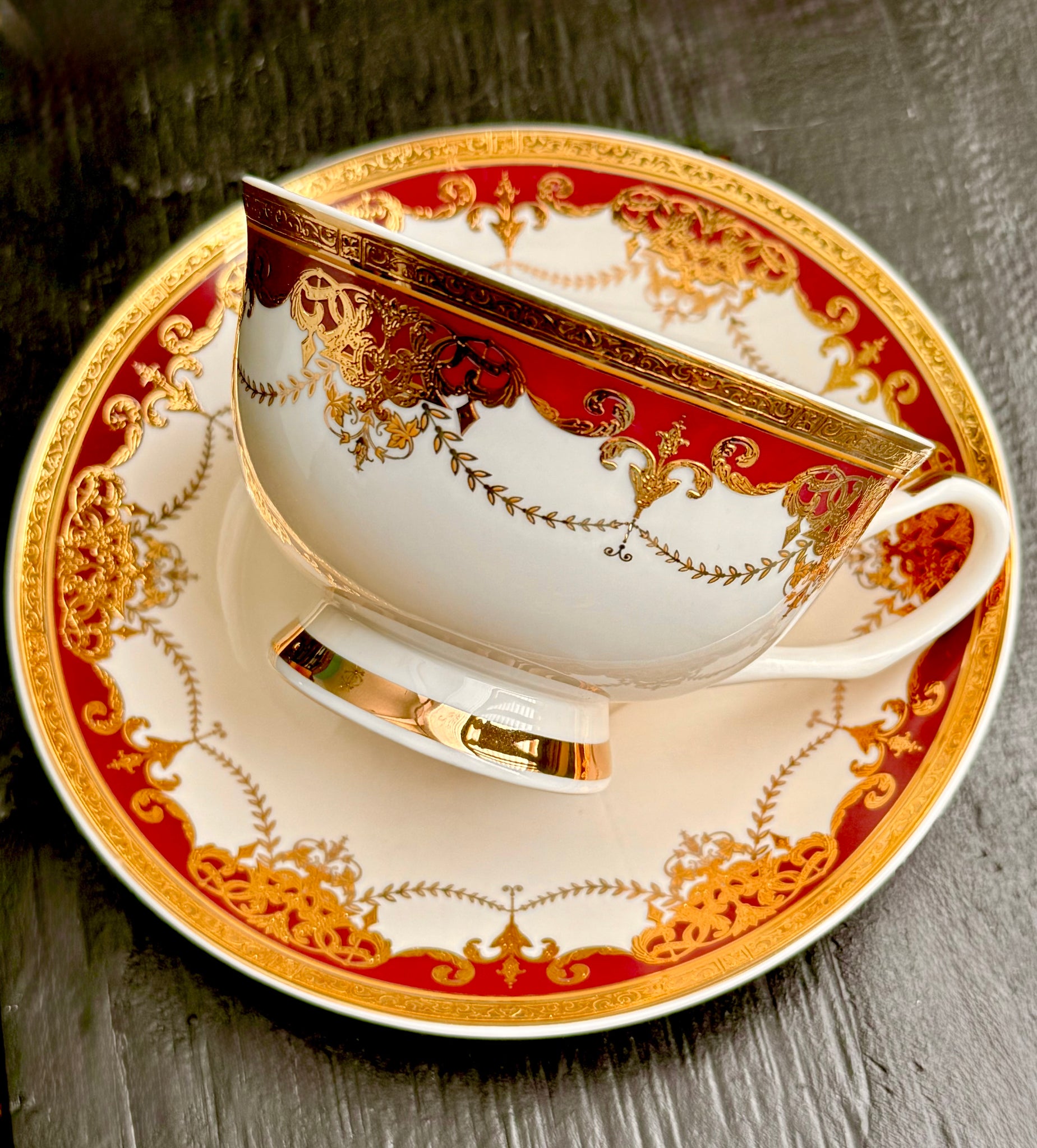 Detailed view of the America the Beautiful Fury Cup and Saucer set, highlighting the artistic elements that represent women's strength and defiance.