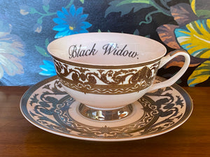 Silver Black Widow cup and saucer