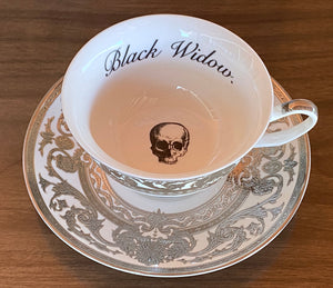 Silver Black Widow cup and saucer